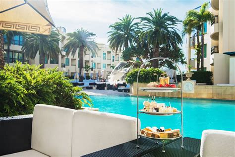 high tea at the palazzo versace main beach gold coast|le jardin versace gold coast.